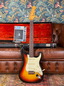 1965 Fender Stratocaster (green guard & clay dots)
