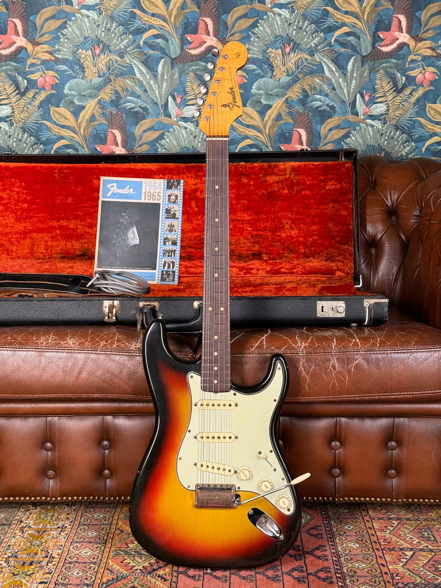1965 Fender Stratocaster (green guard & clay dots)